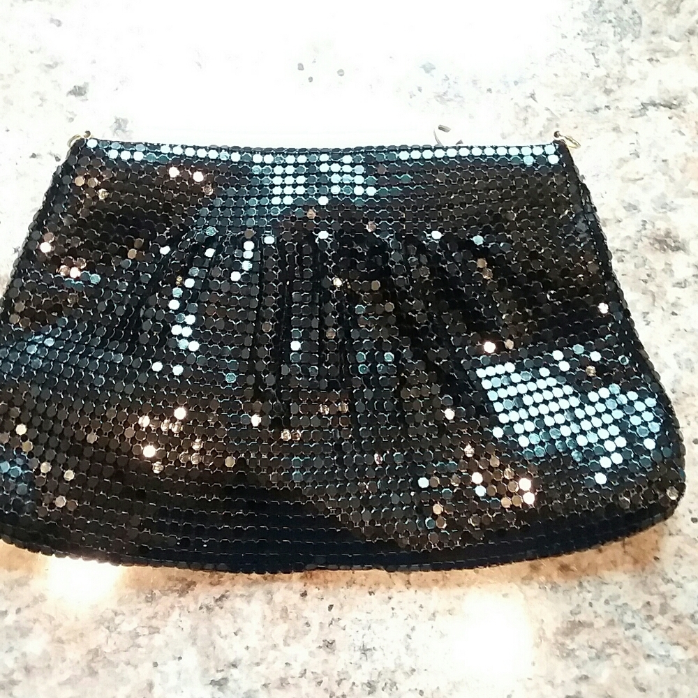 Metal link black mesh evening clutch.